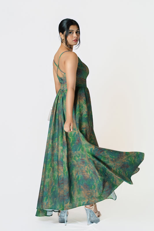 Forest Muse Maxi Dress: green and brown watercolour-print sleeveless V-neck maxi dress with a full skirt, side view, skirt in motion