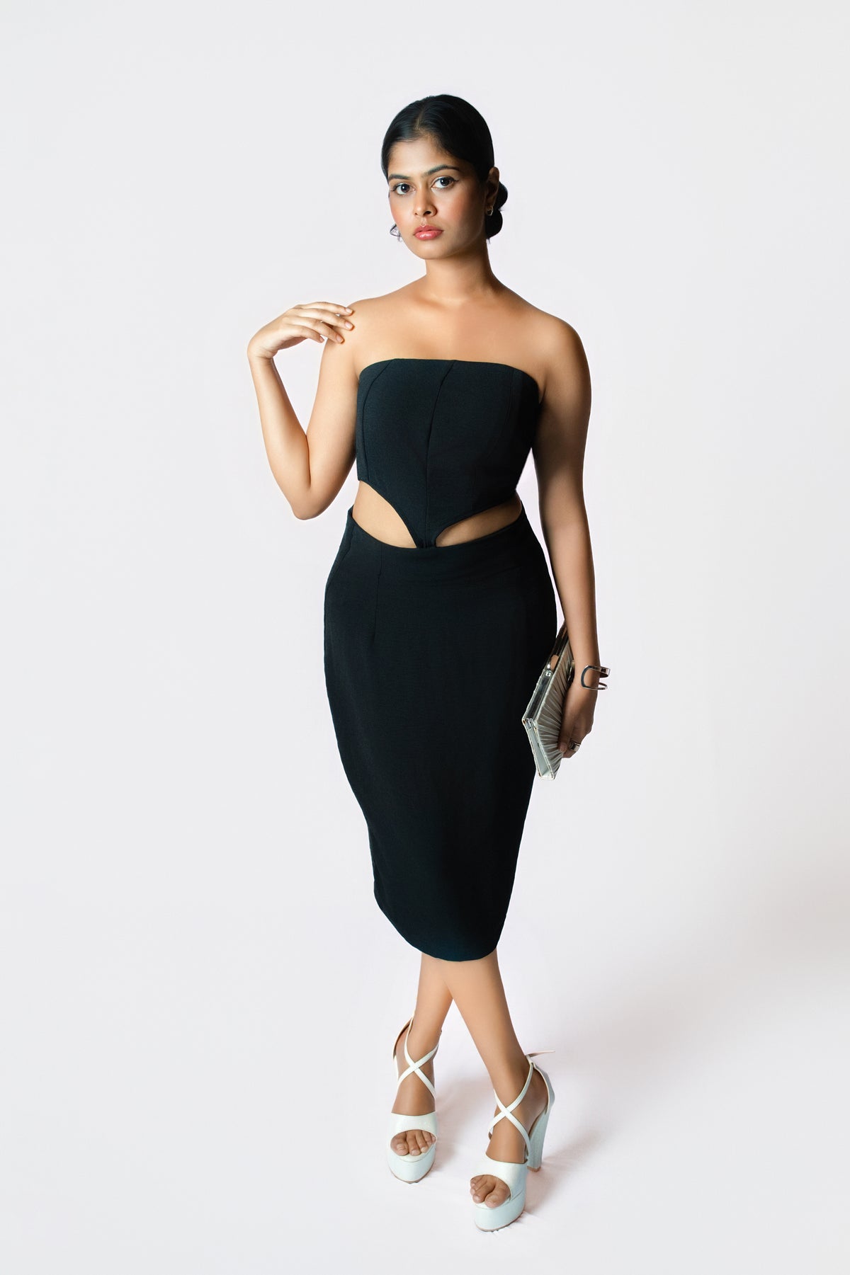 Velvet Eclipse Cutout Dress: black strapless fitted midi dress with waist cut-outs, front view