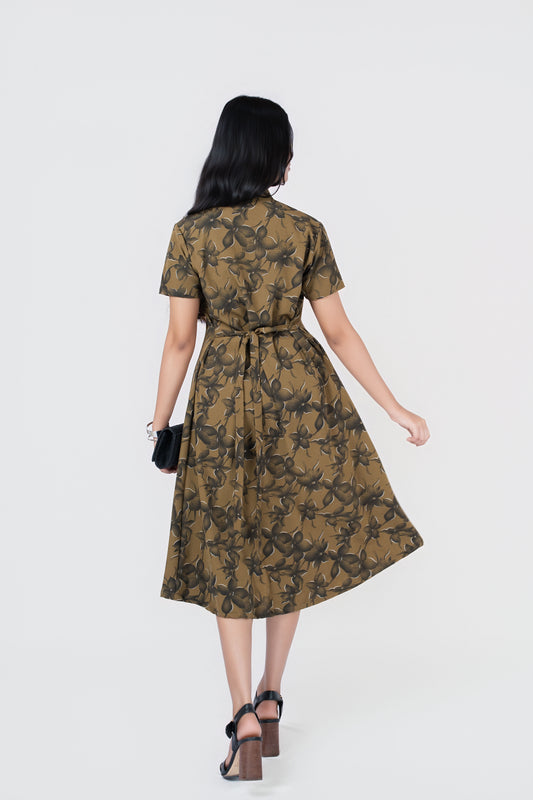 Olive Petal Button-Down Midi Dress: olive floral-print collared midi shirt dress with short sleeves and tie waist, back view showing the tie waist