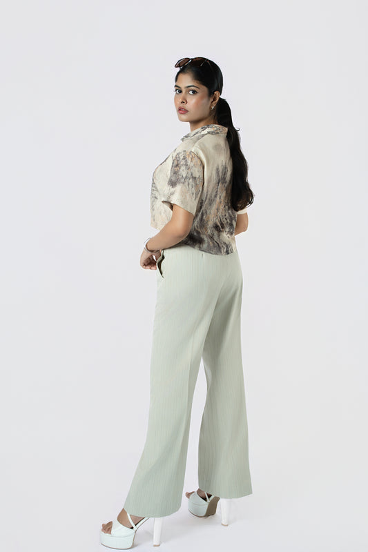 Willow Mist Crop Top: beige and grey brushstroke-print cropped cotton shirt with short sleeves, worn with sage trousers, back view