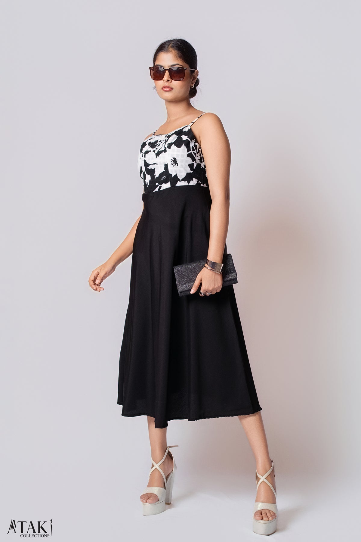 Noir Petal Midi Dress: black cotton midi dress with thin straps and a black and white floral bodice, front view