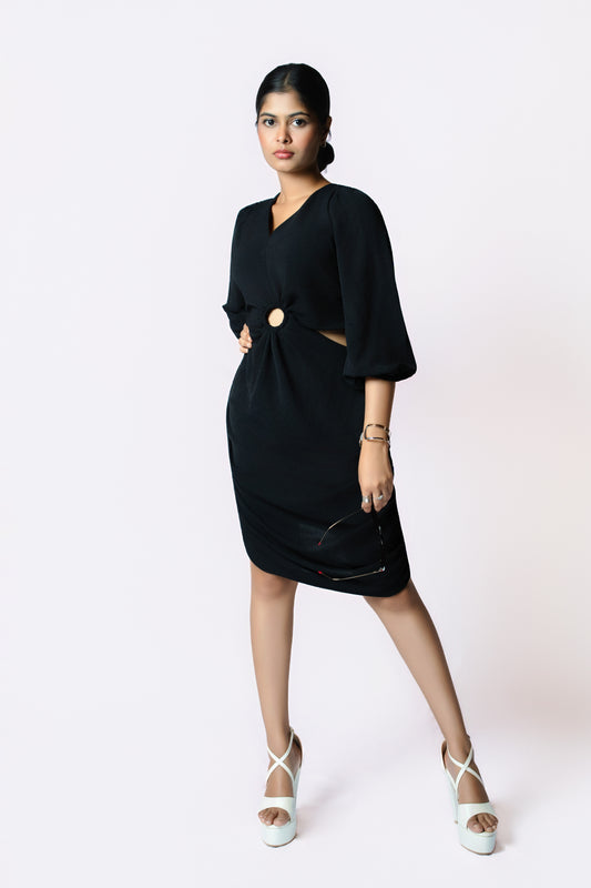 Noir Ring Detail Dress: black V-neck knee-length dress with puff sleeves and a gold ring cut-out at the waist, front view