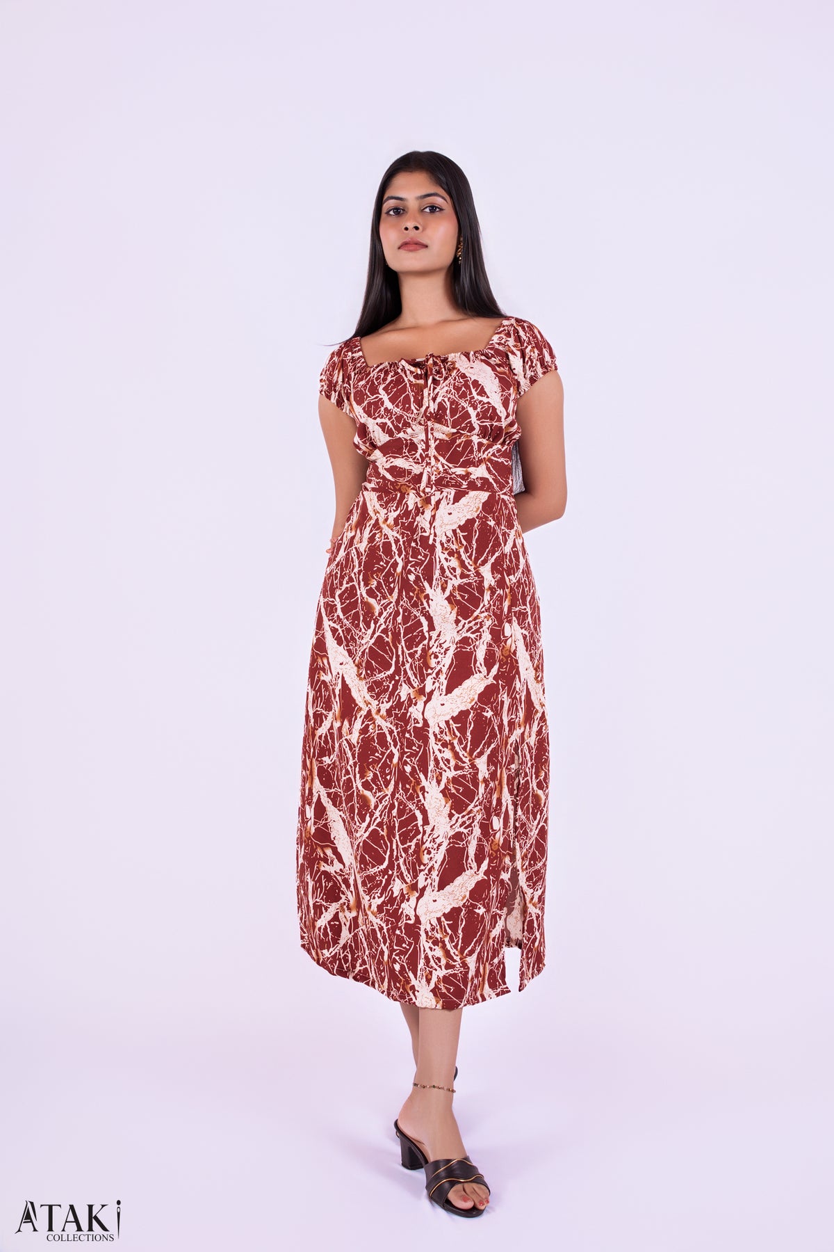 Marble Grace Midi Dress: rust red and cream marble-print midi dress with cap sleeves, front view